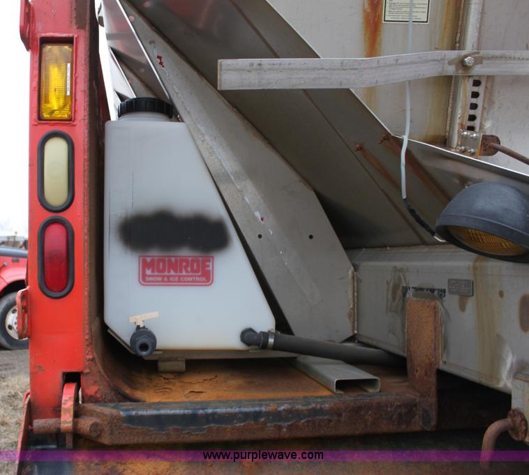 image for item A7166 1999 International 4900 tandem axle dump truck