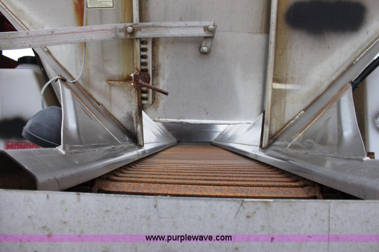 image for item A7166 1999 International 4900 tandem axle dump truck