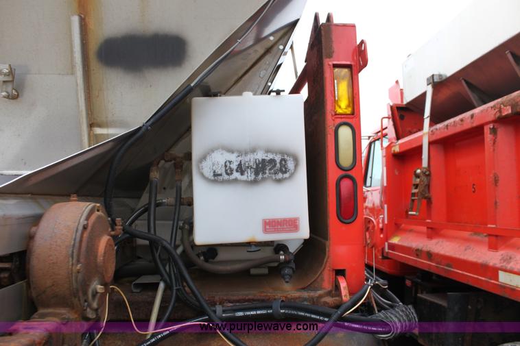 image for item A7166 1999 International 4900 tandem axle dump truck