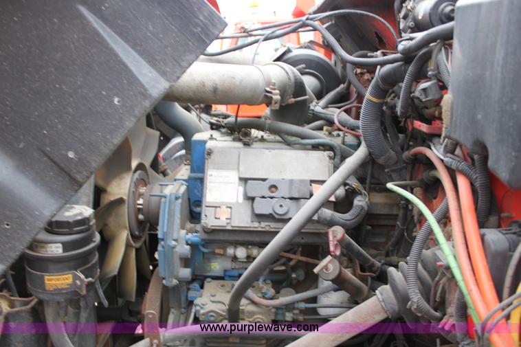 image for item A7166 1999 International 4900 tandem axle dump truck