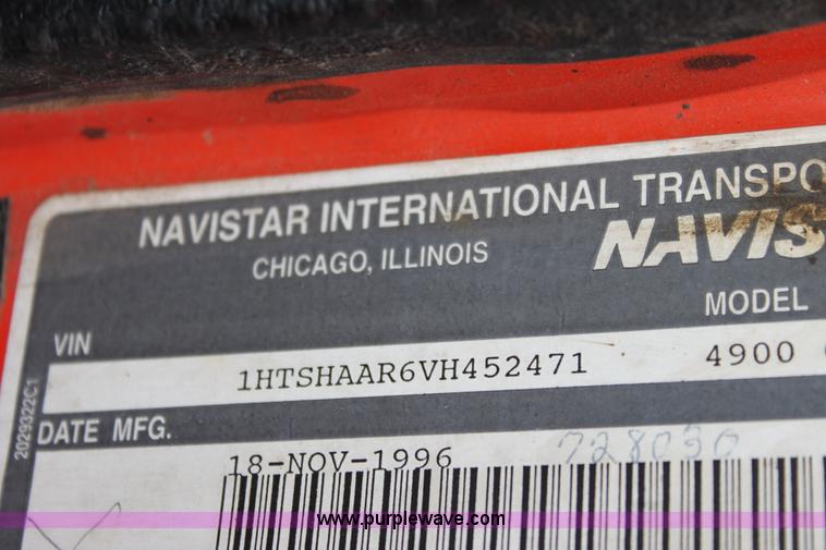 image for item A7167 1997 International 4900 tandem axle dump truck