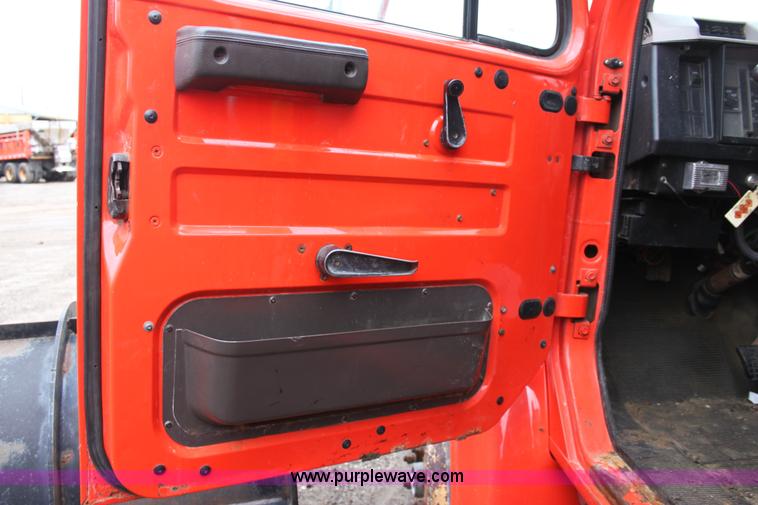 image for item A7168 1997 International 4900 tandem axle dump truck