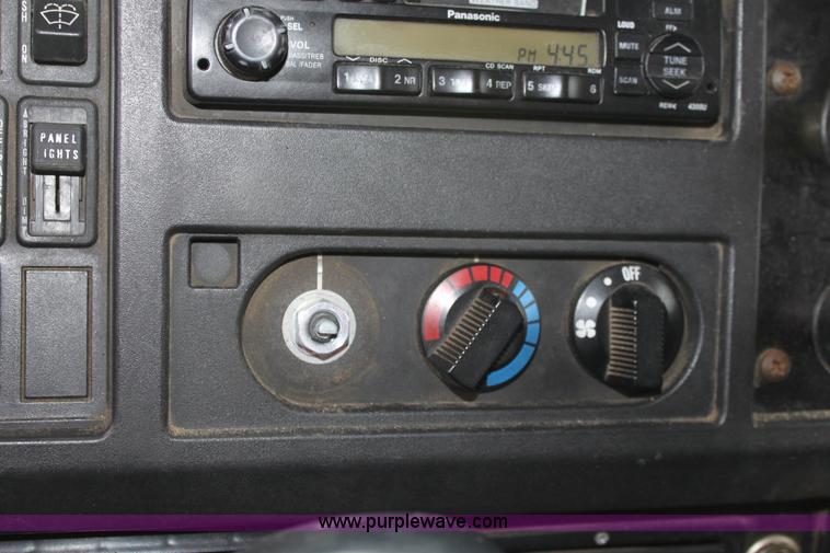 image for item A7168 1997 International 4900 tandem axle dump truck