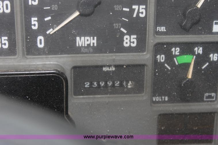 image for item A7168 1997 International 4900 tandem axle dump truck