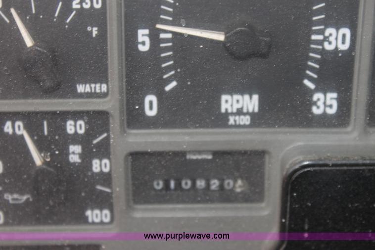 image for item A7168 1997 International 4900 tandem axle dump truck