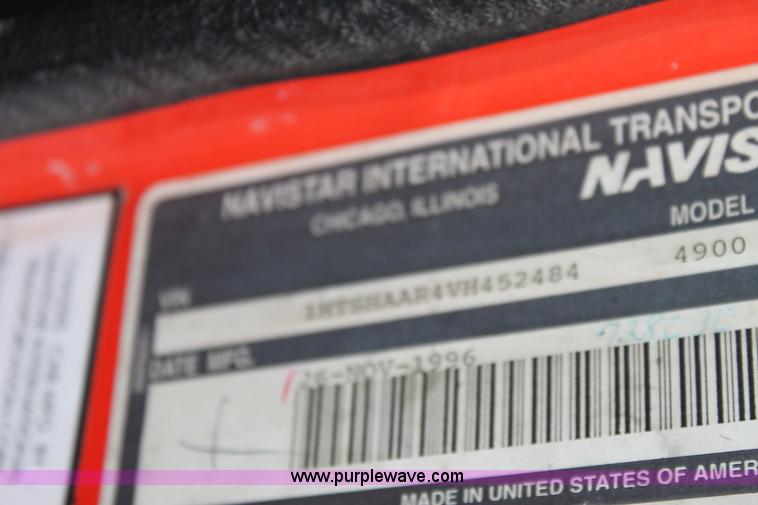 image for item A7168 1997 International 4900 tandem axle dump truck