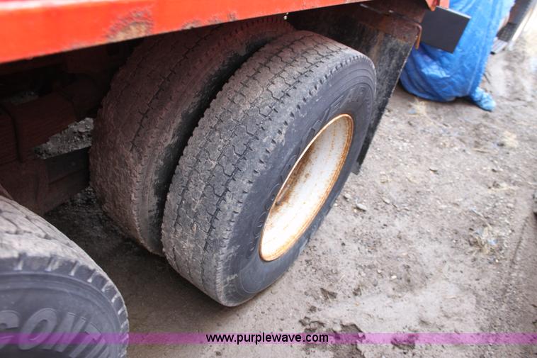 image for item A7168 1997 International 4900 tandem axle dump truck