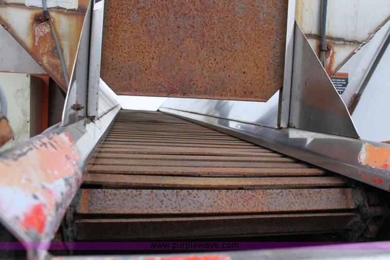 image for item A7168 1997 International 4900 tandem axle dump truck