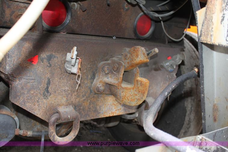 image for item A7168 1997 International 4900 tandem axle dump truck