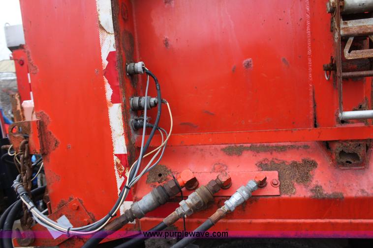 image for item A7168 1997 International 4900 tandem axle dump truck