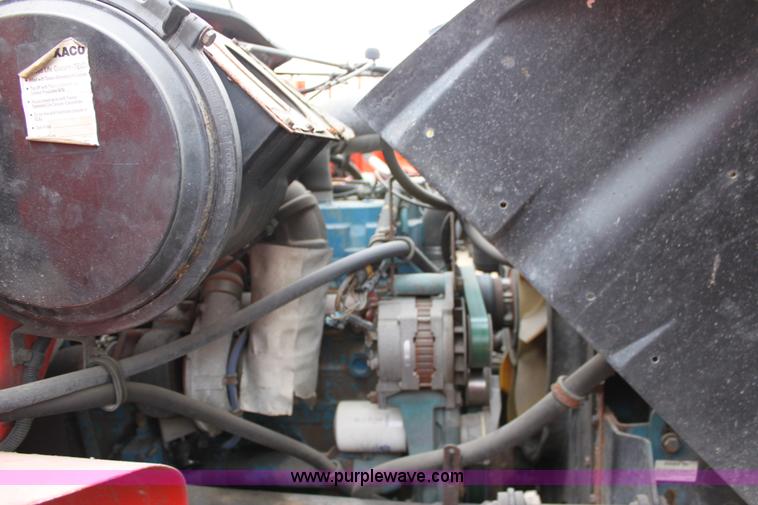 image for item A7171 1999 International 4900 tandem axle dump truck