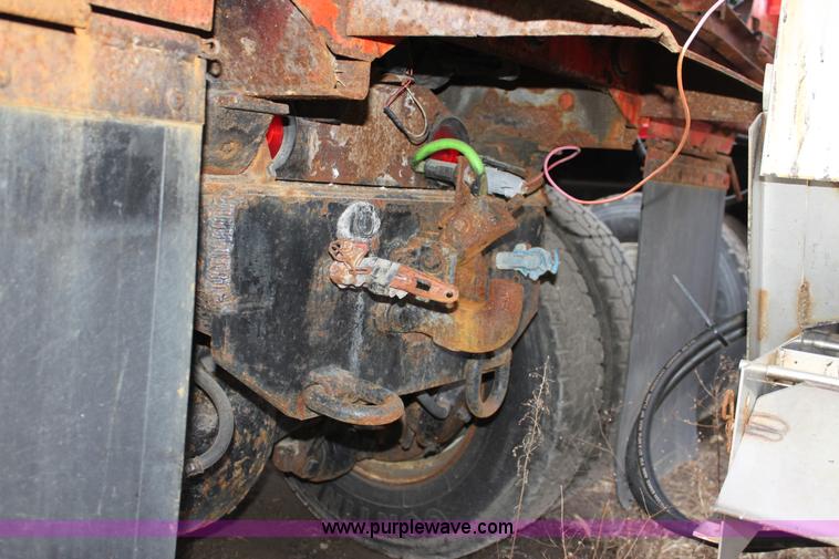 image for item A7172 1997 International 4900 tandem axle dump truck