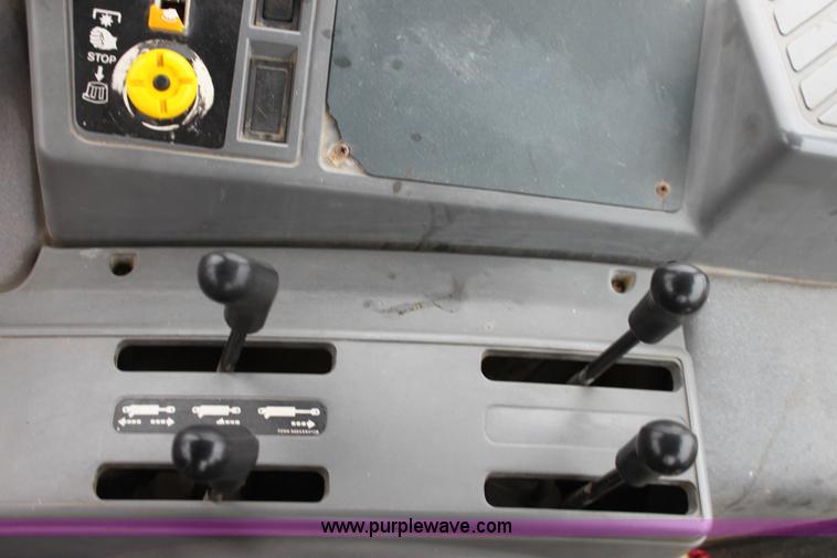 image for item A7200 1997 New Holland 6640SL tractor