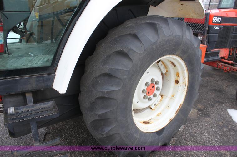 image for item A7200 1997 New Holland 6640SL tractor