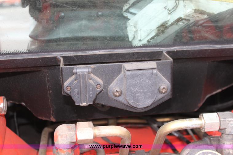 image for item A7200 1997 New Holland 6640SL tractor