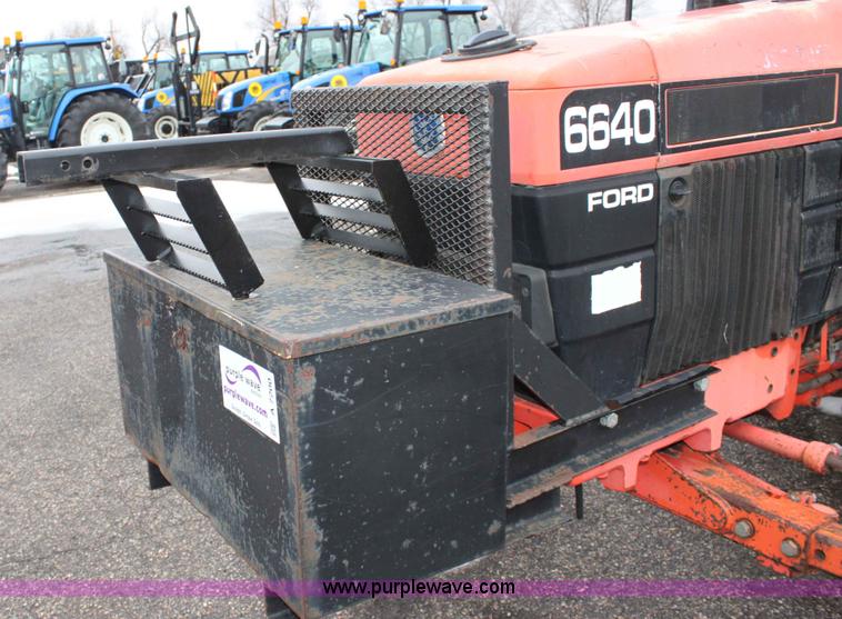 image for item A7200 1997 New Holland 6640SL tractor
