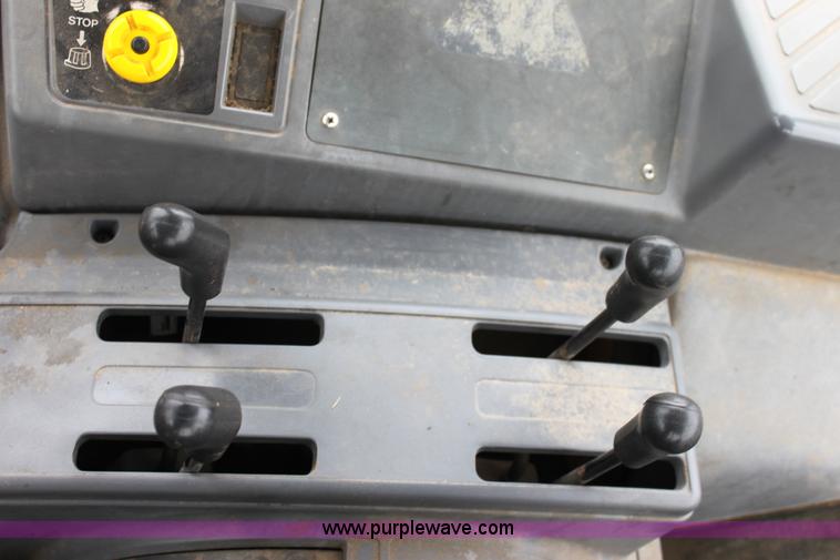 image for item A7201 1996 New Holland 6640SL tractor
