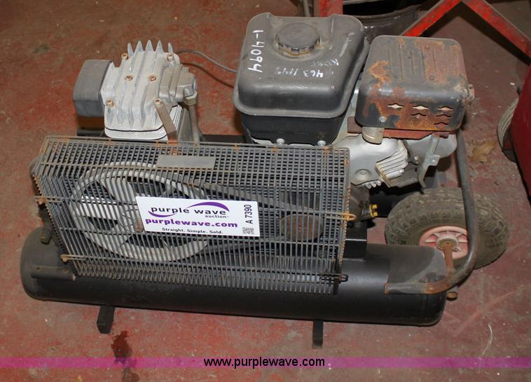 image for item A7390 2004 Central Pneumatic 90749-VGA portable air compressor