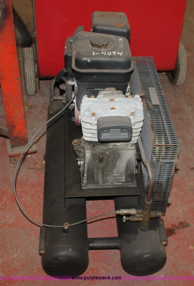 image for item A7390 2004 Central Pneumatic 90749-VGA portable air compressor