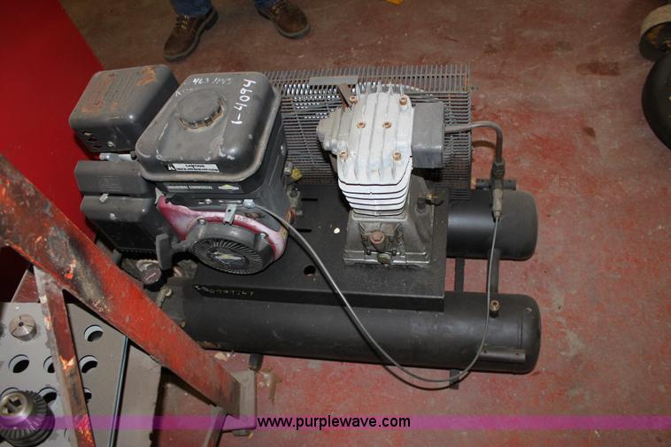 image for item A7390 2004 Central Pneumatic 90749-VGA portable air compressor