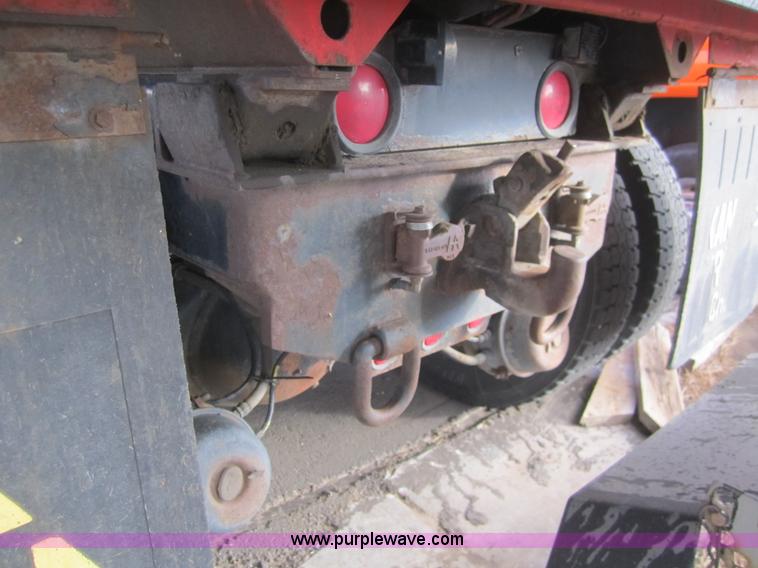 image for item B5659 1999 International 4900 tandem axle dump truck