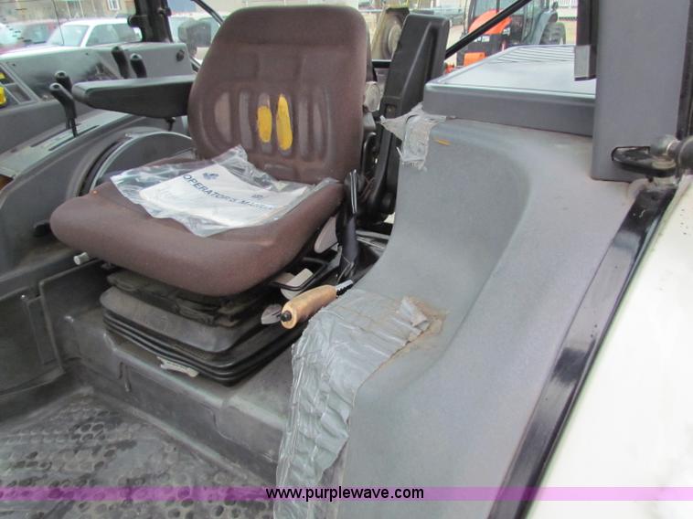 image for item B7074 1997 New Holland 6640SL tractor