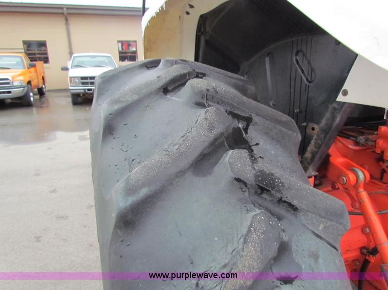 image for item B7074 1997 New Holland 6640SL tractor