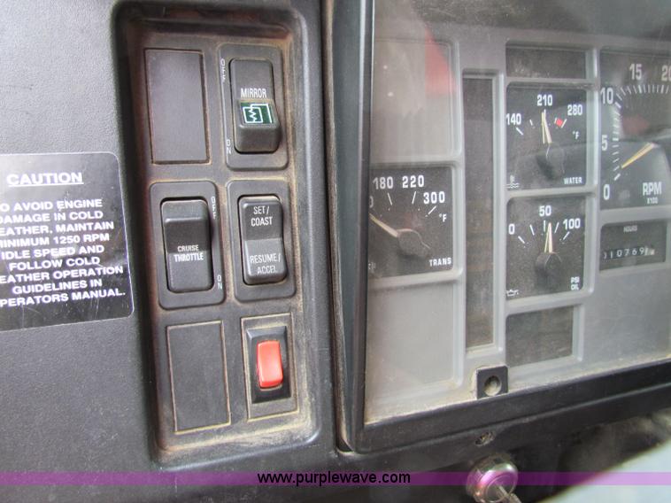 image for item B7075 1999 International 4900 tandem axle dump truck