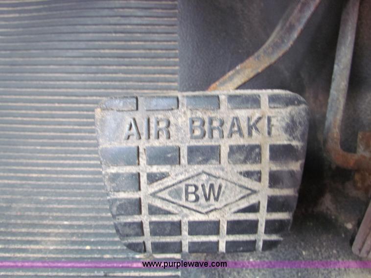 image for item B7075 1999 International 4900 tandem axle dump truck