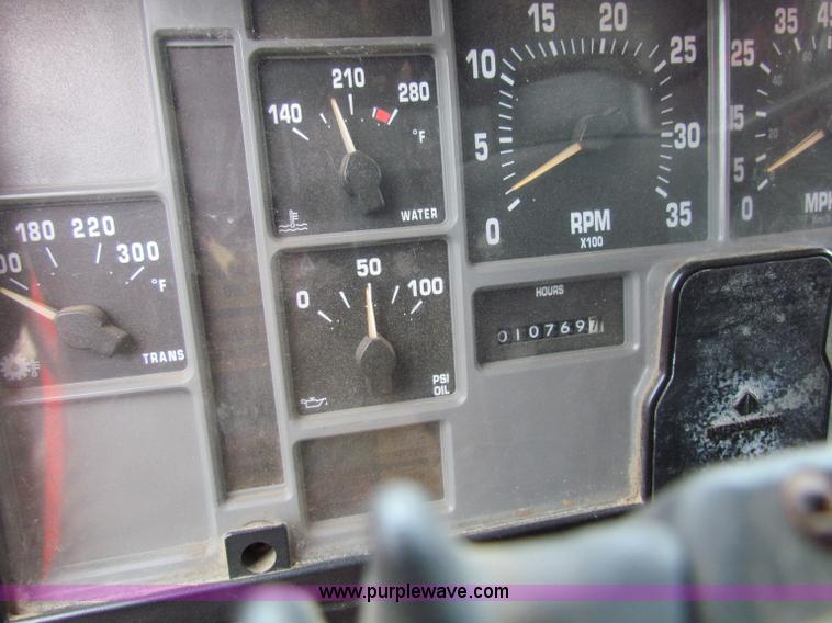 image for item B7075 1999 International 4900 tandem axle dump truck