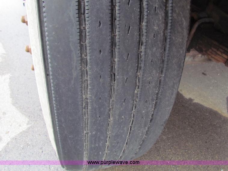 image for item B7075 1999 International 4900 tandem axle dump truck