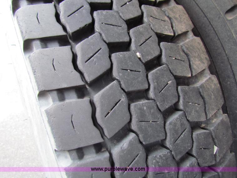 image for item B7075 1999 International 4900 tandem axle dump truck