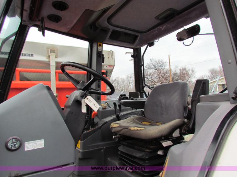 image for item B7076 1997 New Holland 6640SL tractor