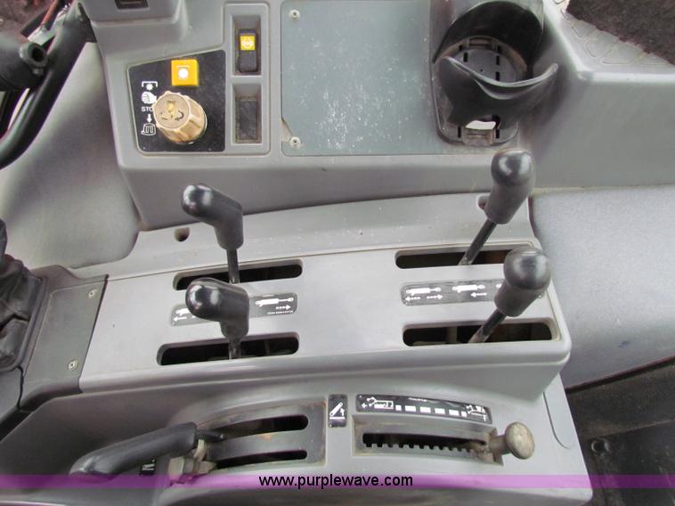 image for item B7076 1997 New Holland 6640SL tractor