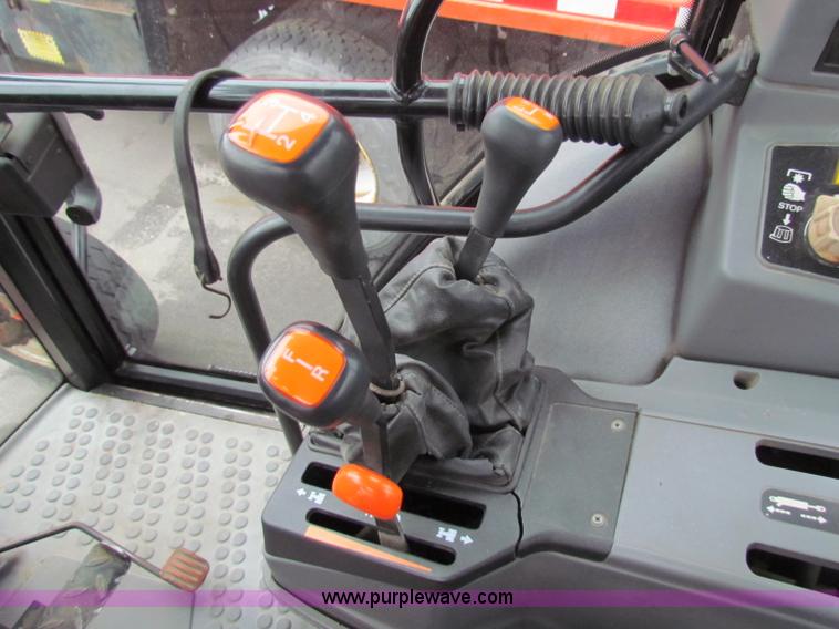image for item B7076 1997 New Holland 6640SL tractor