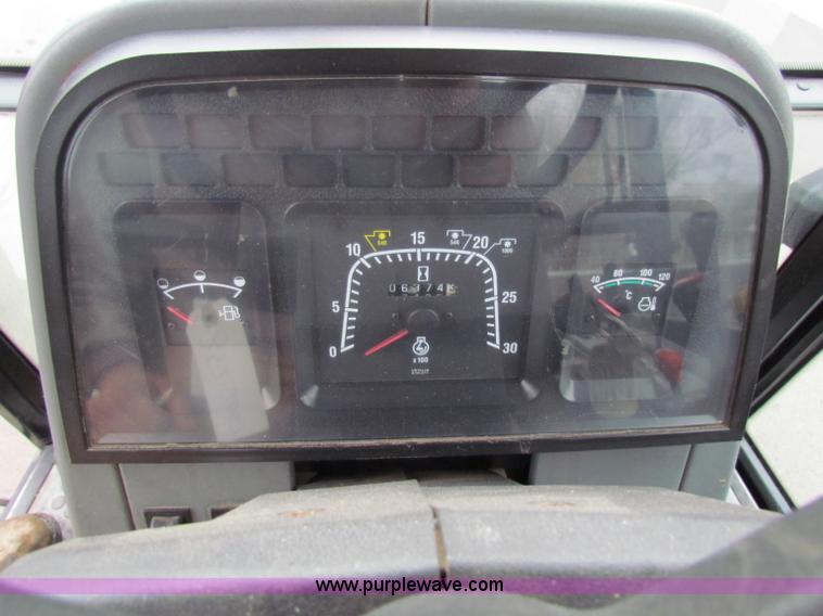 image for item B7078 1997 New Holland 6640SL tractor