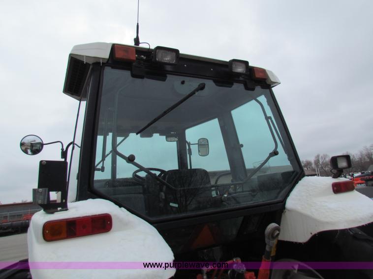 image for item B7078 1997 New Holland 6640SL tractor
