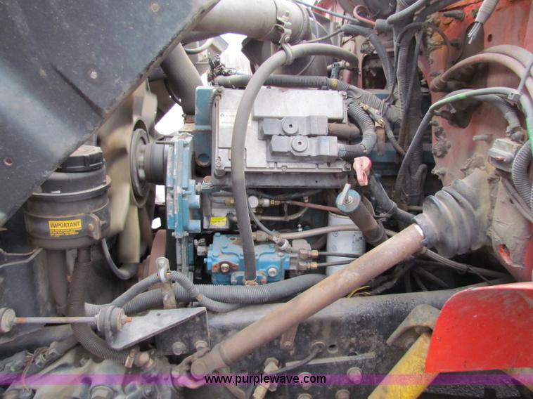 image for item B7127 1999 International 4900 tandem axle dump truck