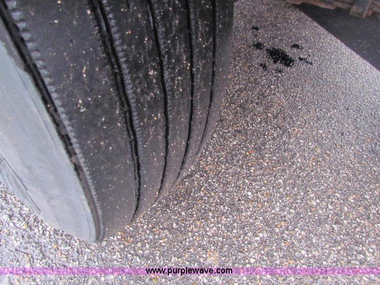 image for item B7127 1999 International 4900 tandem axle dump truck