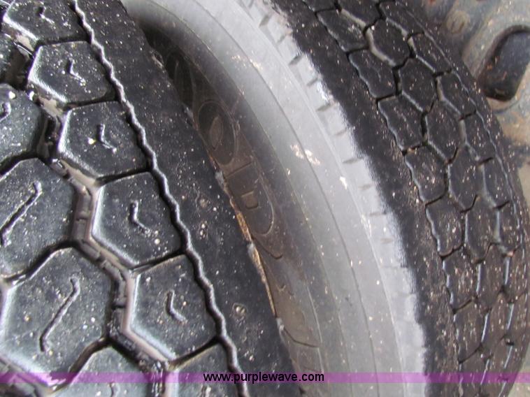 image for item B7127 1999 International 4900 tandem axle dump truck