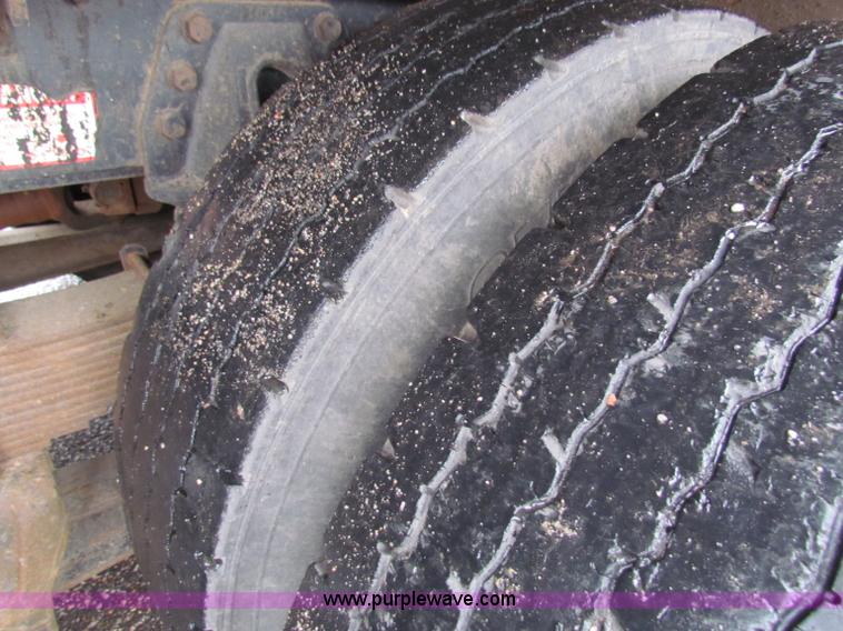 image for item B7127 1999 International 4900 tandem axle dump truck