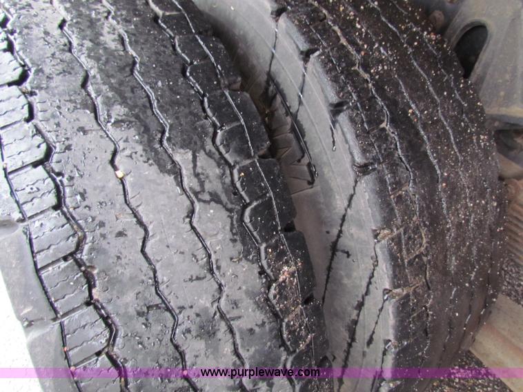 image for item B7127 1999 International 4900 tandem axle dump truck