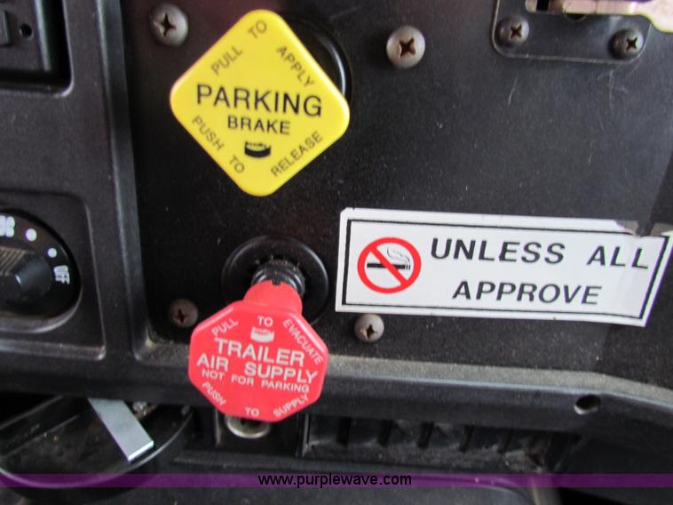 image for item B7128 1999 International 4900 tandem axle dump truck