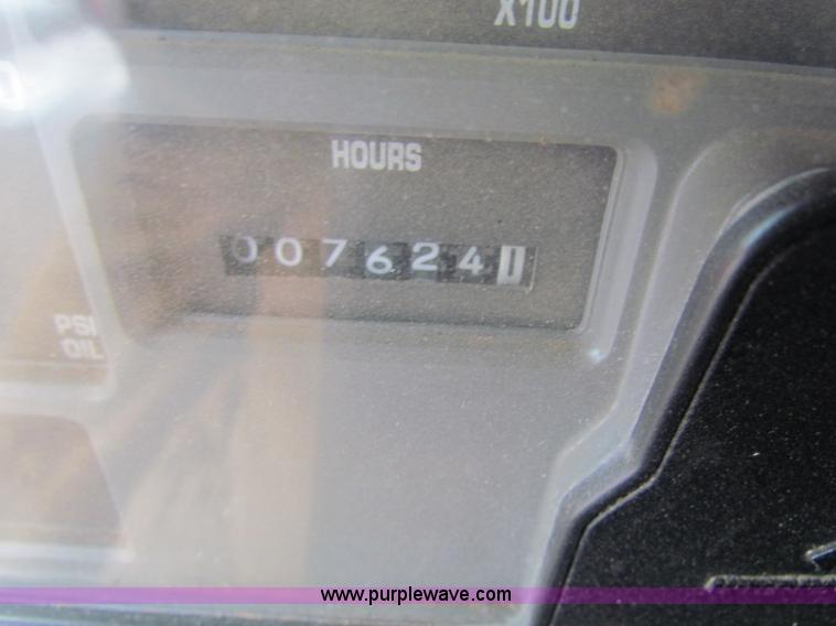 image for item B7128 1999 International 4900 tandem axle dump truck