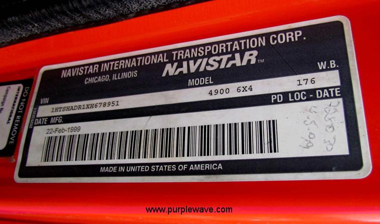 image for item B7128 1999 International 4900 tandem axle dump truck