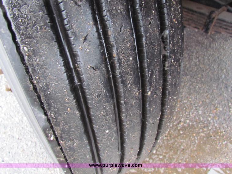 image for item B7128 1999 International 4900 tandem axle dump truck