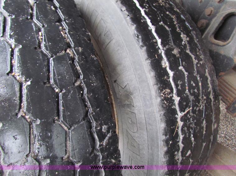 image for item B7128 1999 International 4900 tandem axle dump truck