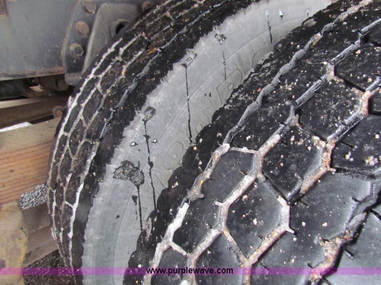 image for item B7128 1999 International 4900 tandem axle dump truck