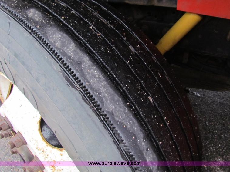 image for item B7128 1999 International 4900 tandem axle dump truck