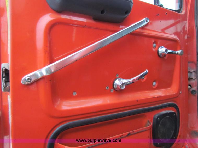 image for item B7129 1995 Ford LNT8000 tandem axle dump truck